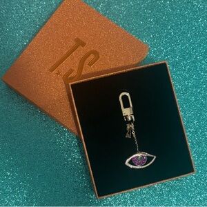 Taylor Swift Life Of A Showgirl Delux CD & Purple Eye Keychain Accessory